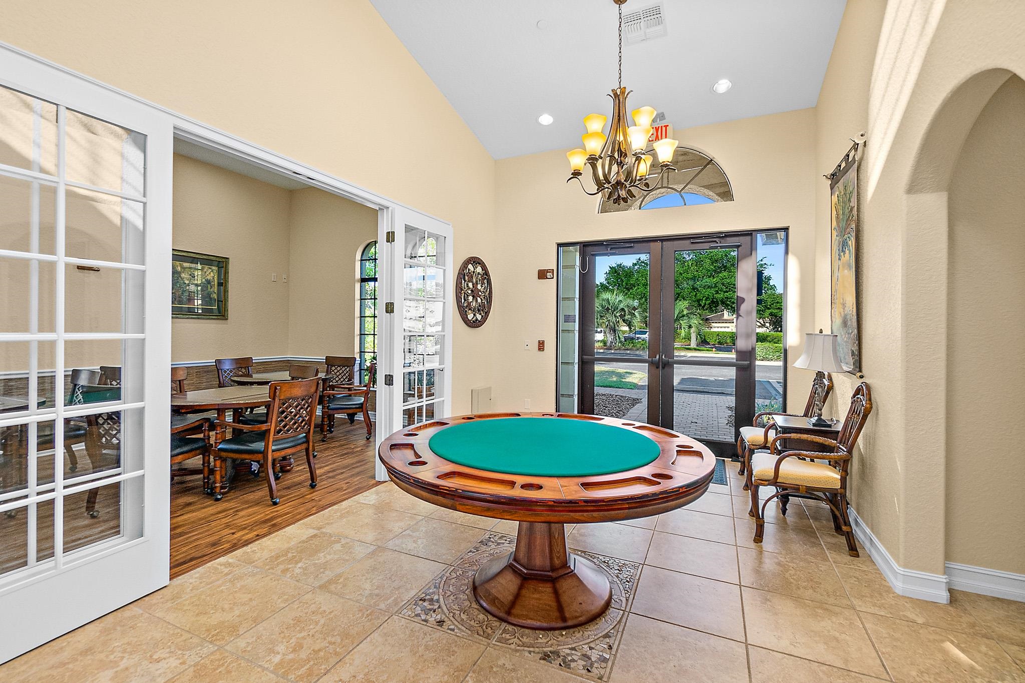 131 Laterra Links Circle, Unit 101 St. Augustine, FL 32092 - Photo 53 of 60 a view of a dining room with furniture window and outside view
