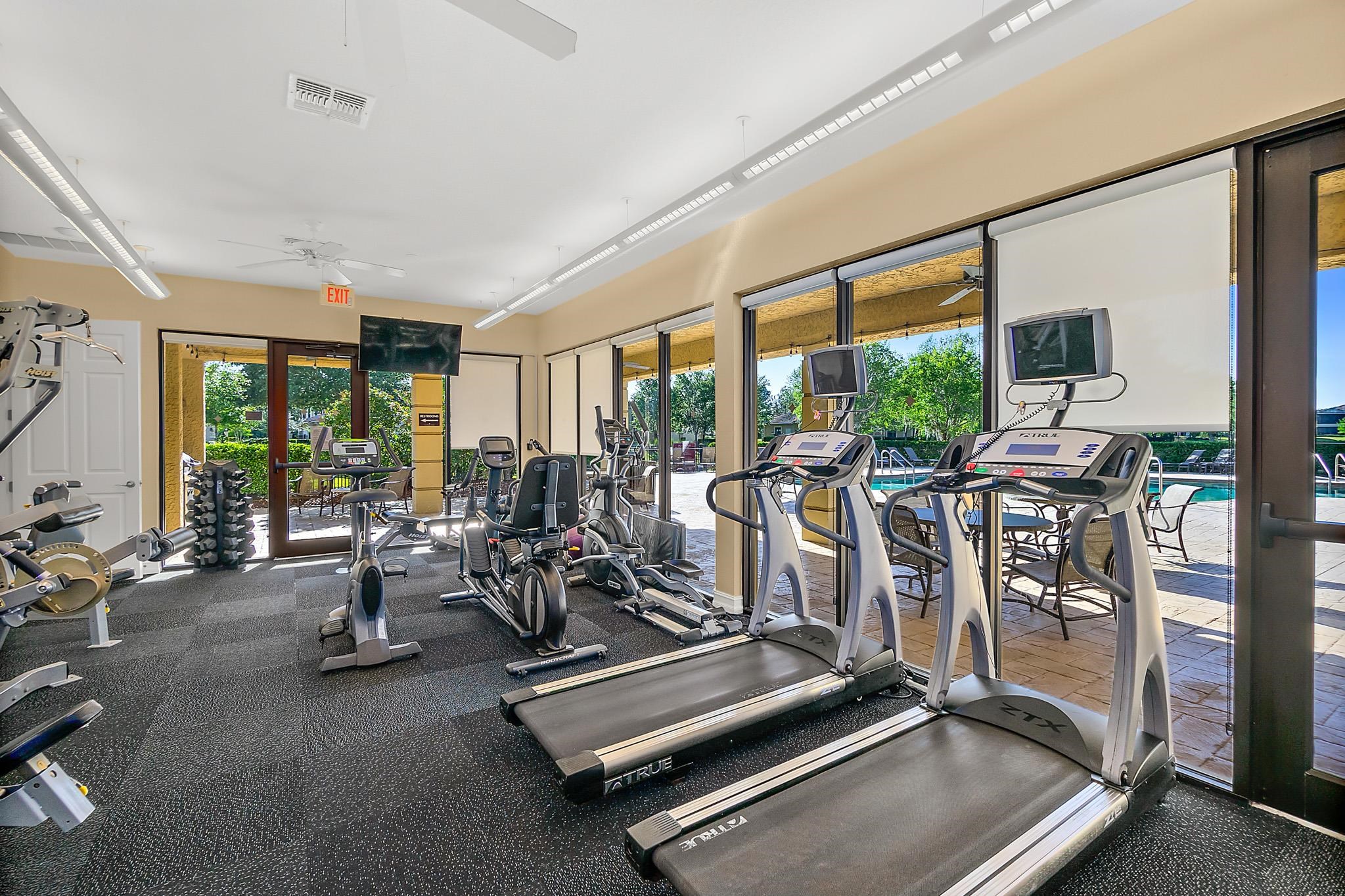 131 Laterra Links Circle, Unit 101 St. Augustine, FL 32092 - Photo 57 of 60 a view of a room with gym equipment