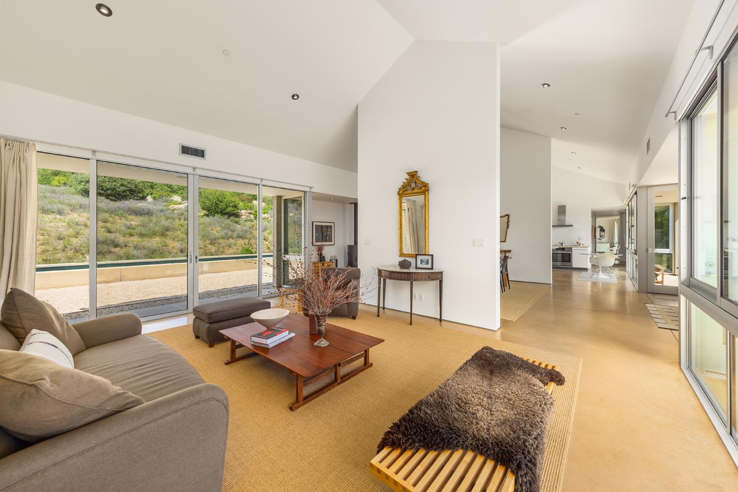 12179 Koenigstein Road Santa Paula, CA 93060 - Photo 16 of 43 a living room with furniture and a floor to ceiling window