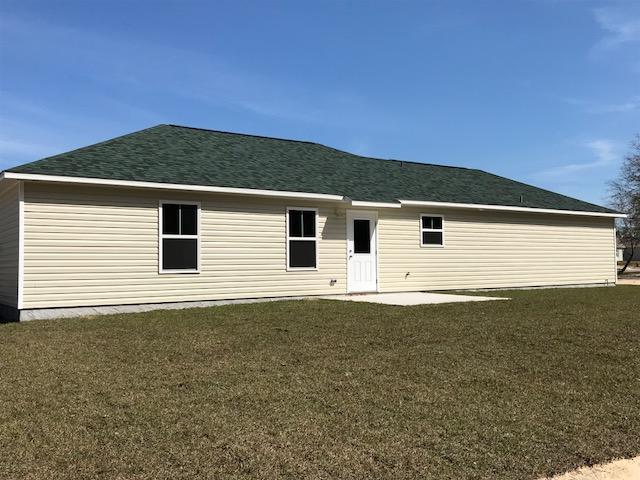 6010 Medfords Way Crestview, FL 32539 - Photo 2 of 15 a view of a back yard of the house