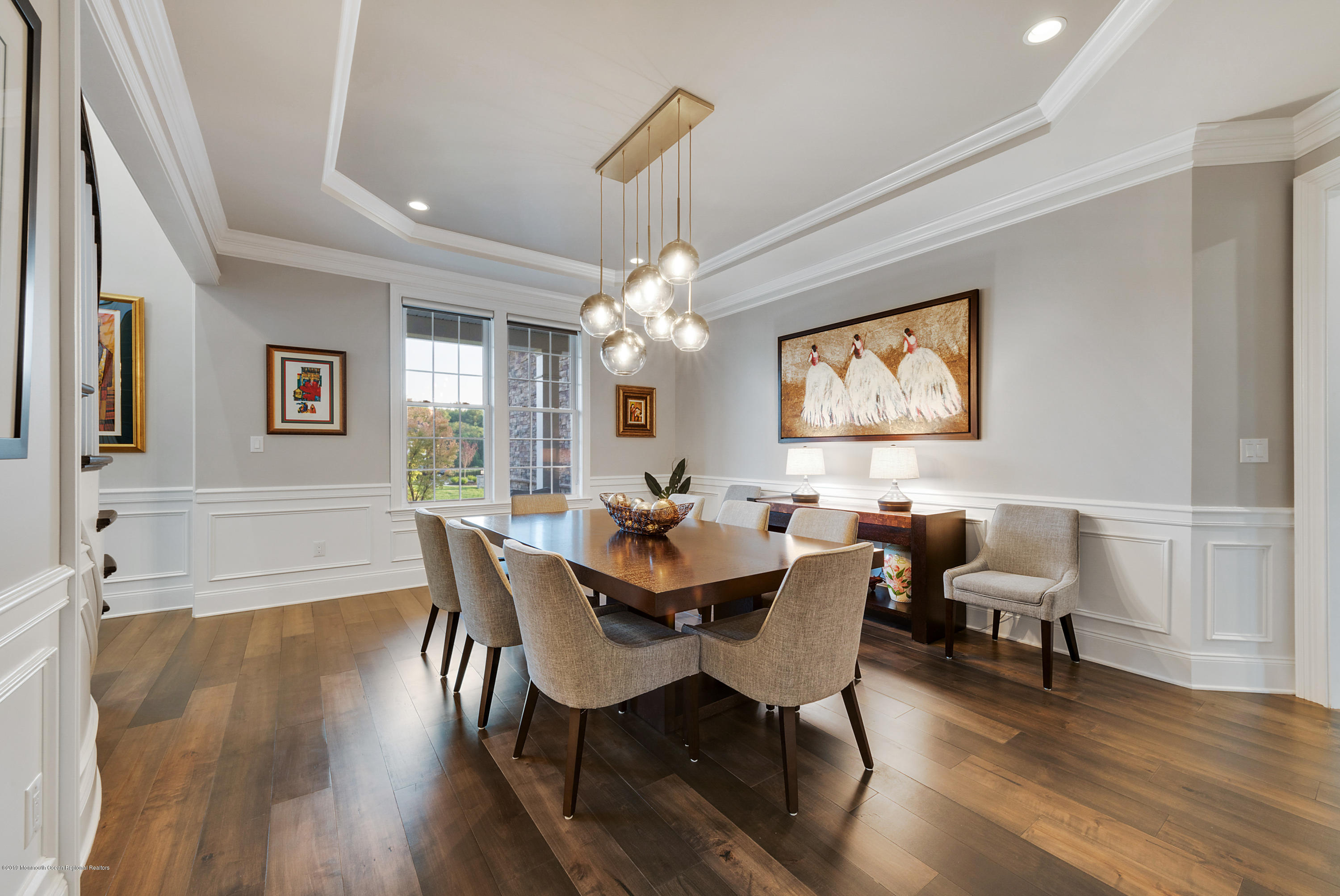 42 Windermere Road Lincroft, NJ 07738 - Photo 16 of 50 a view of a dining room with furniture window and wooden floor
