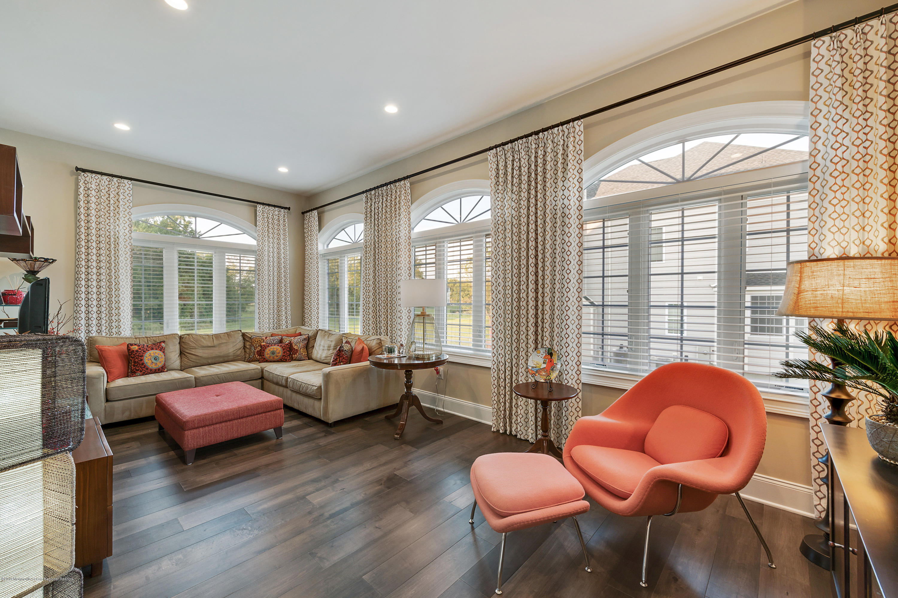 42 Windermere Road Lincroft, NJ 07738 - Photo 18 of 50 a living room with furniture and floor to ceiling windows