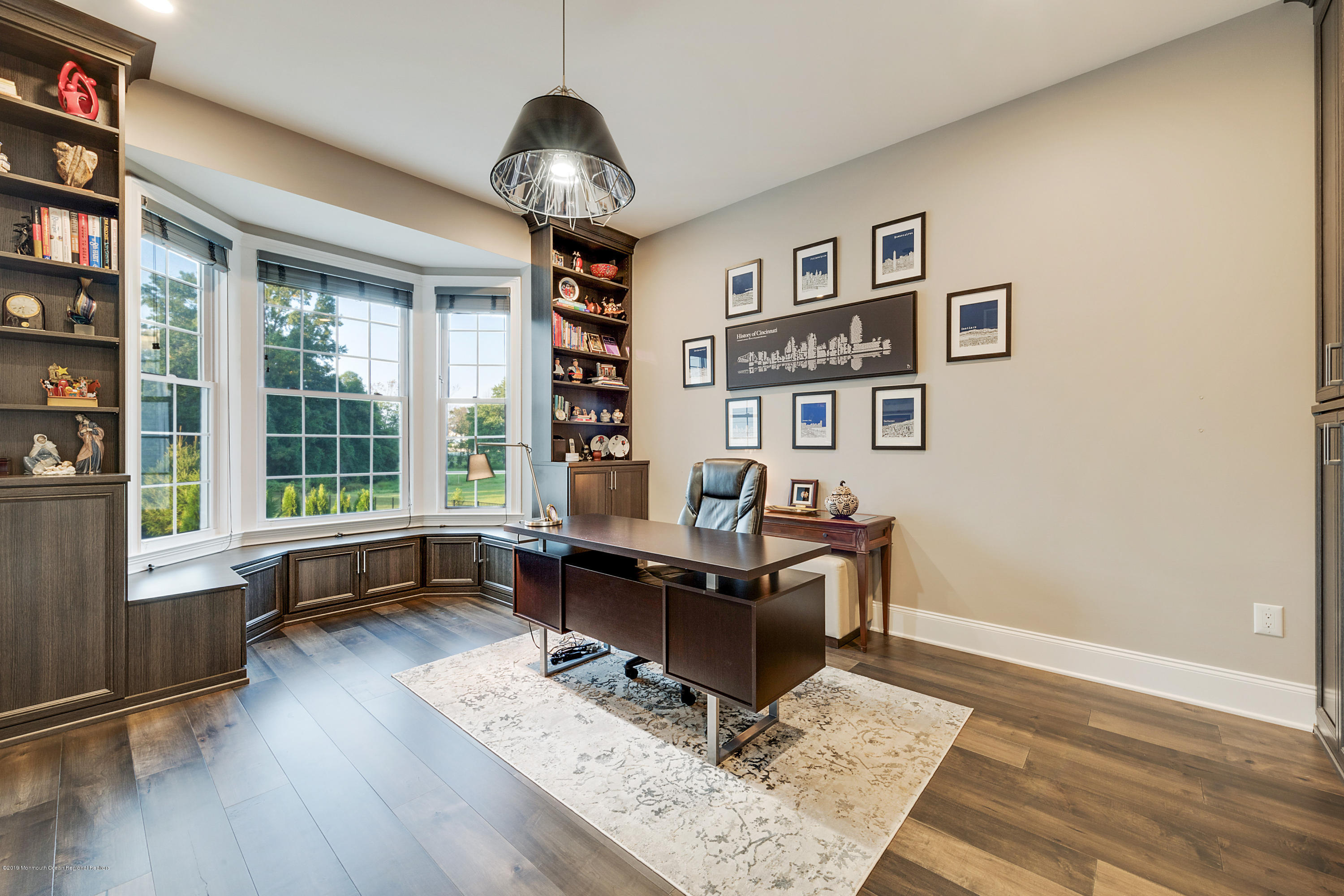 42 Windermere Road Lincroft, NJ 07738 - Photo 19 of 50 a view of a workspace with furniture and a window