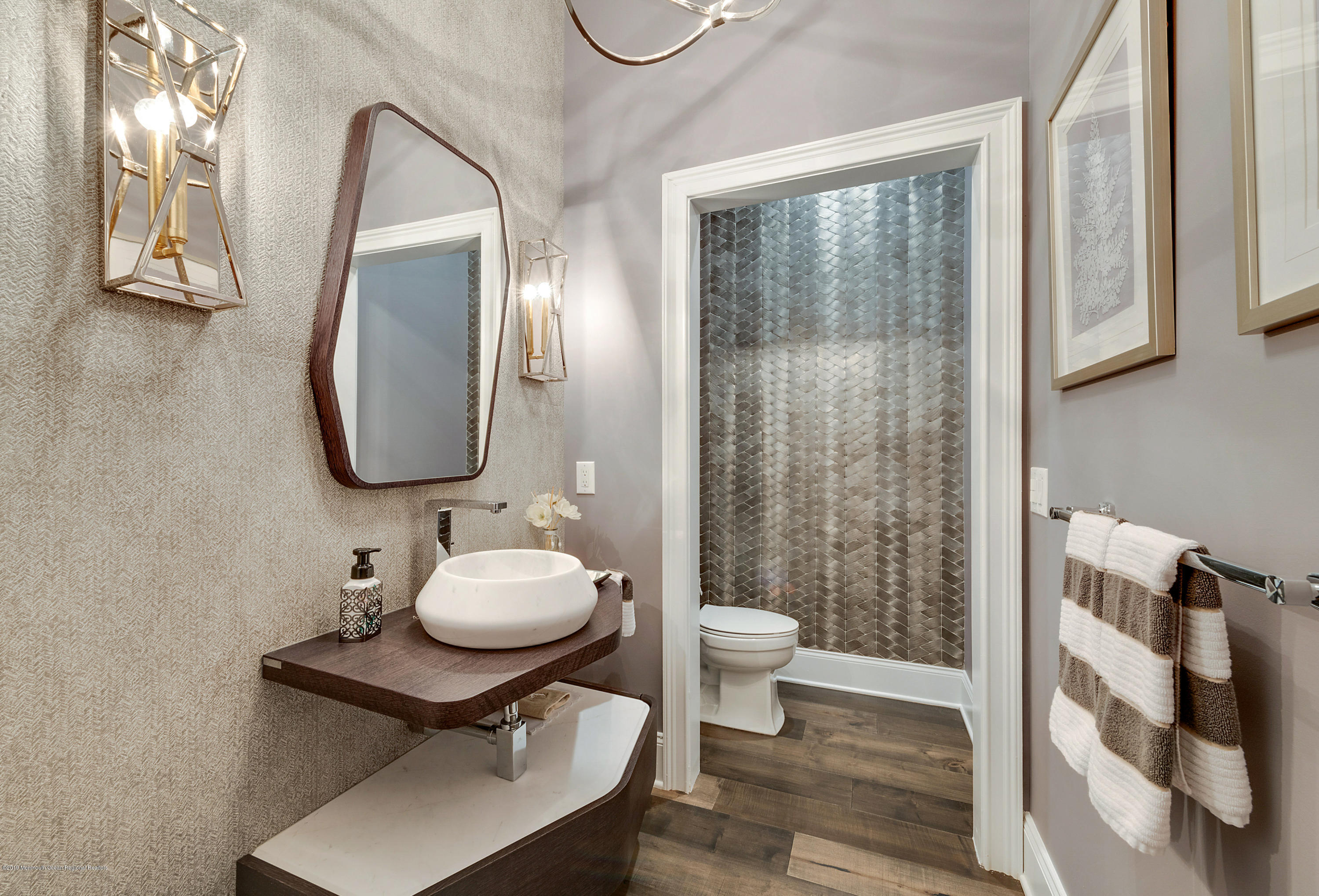 42 Windermere Road Lincroft, NJ 07738 - Photo 20 of 50 a bathroom with a toilet sink and mirror