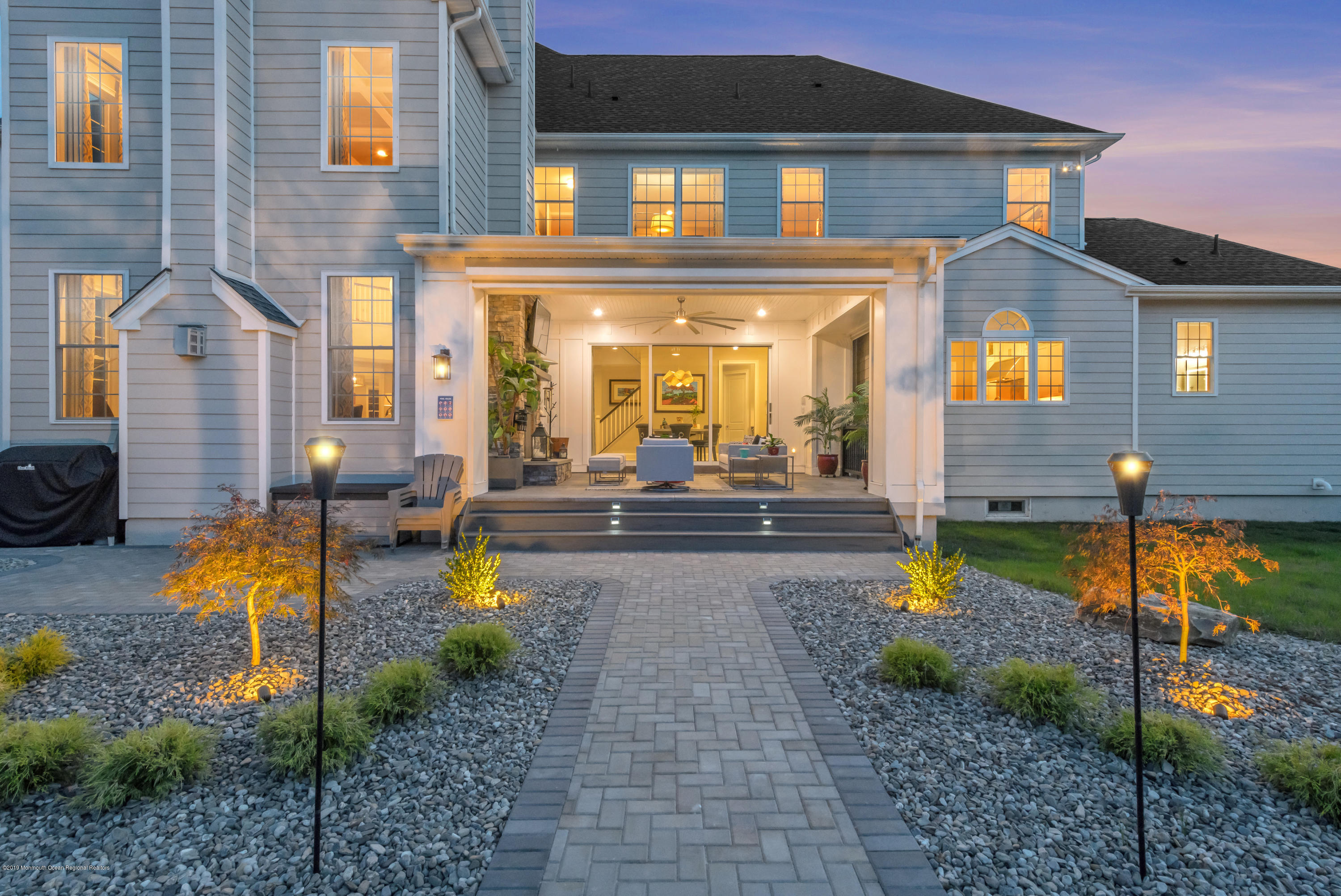 42 Windermere Road Lincroft, NJ 07738 - Photo 48 of 50 a view of a house with patio