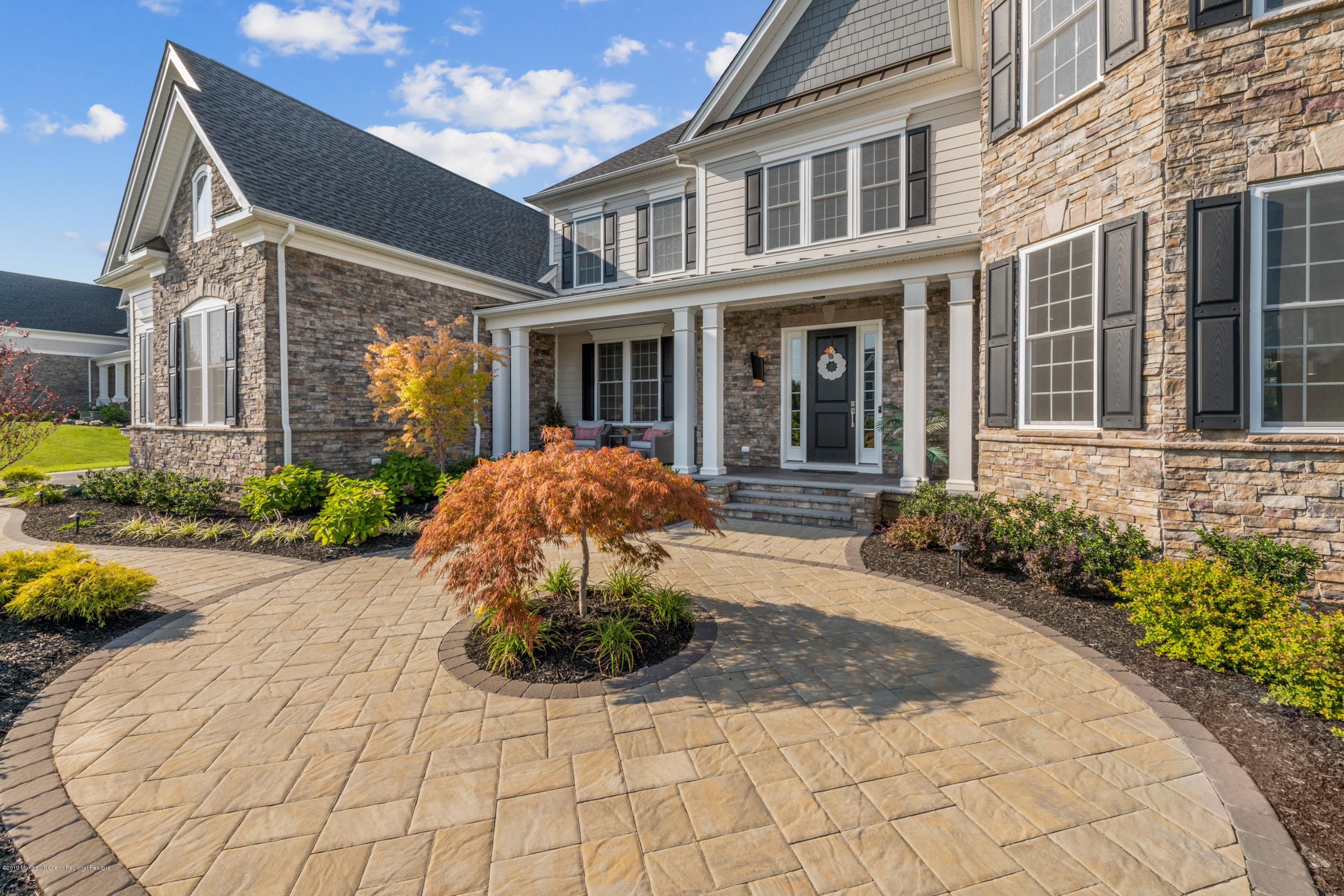 42 Windermere Road Lincroft, NJ 07738 - Photo 7 of 50 a front view of a house