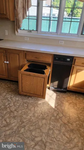 a kitchen with a stove and a microwave