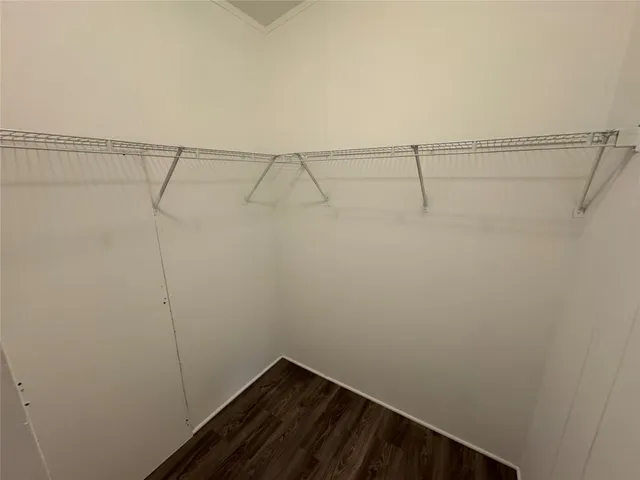 a view of a room with racks on the wall