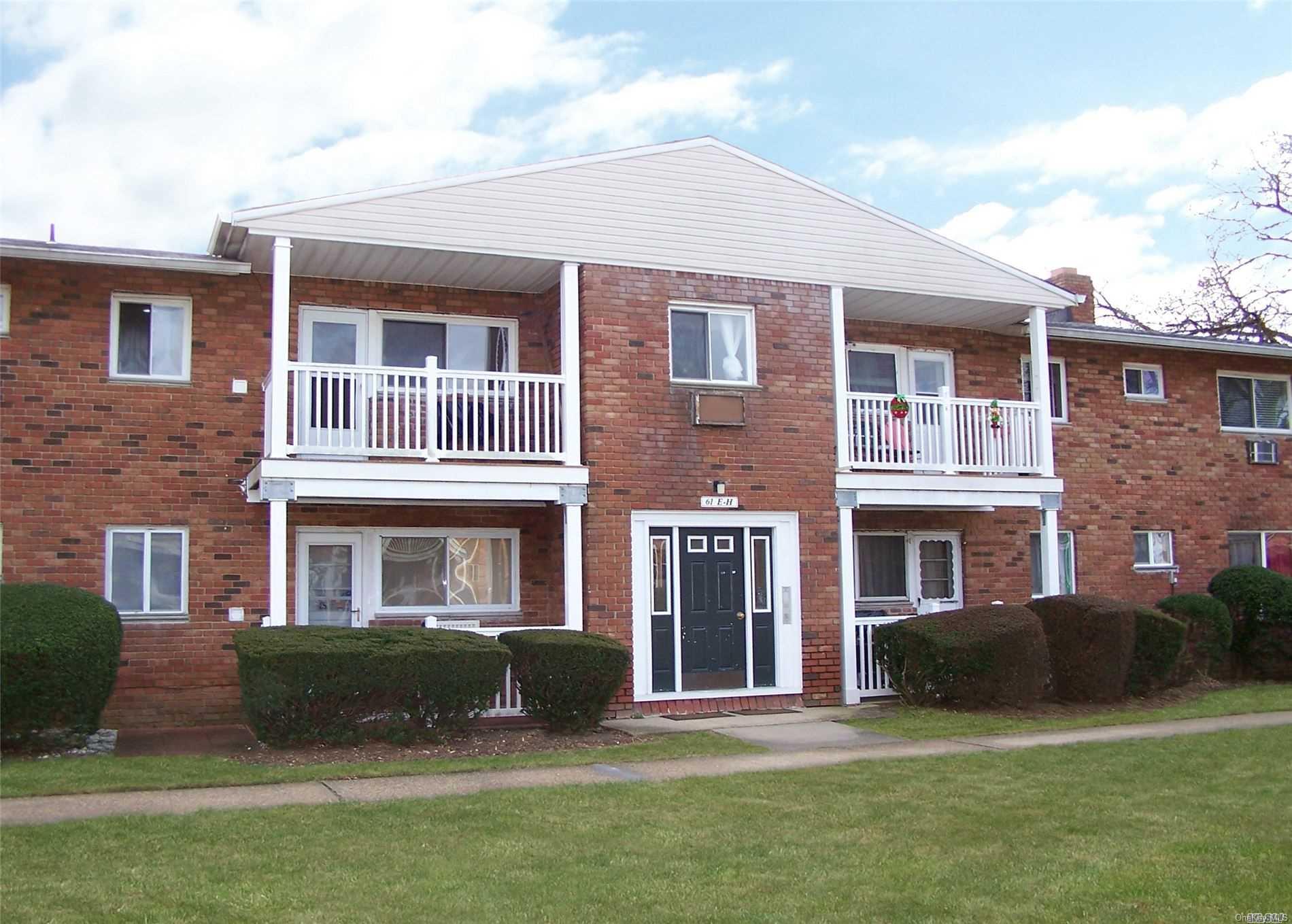 61 Adams Road, Unit 2E Central Islip, NY 11722 - Photo 1 of 1 Front Of Bldg