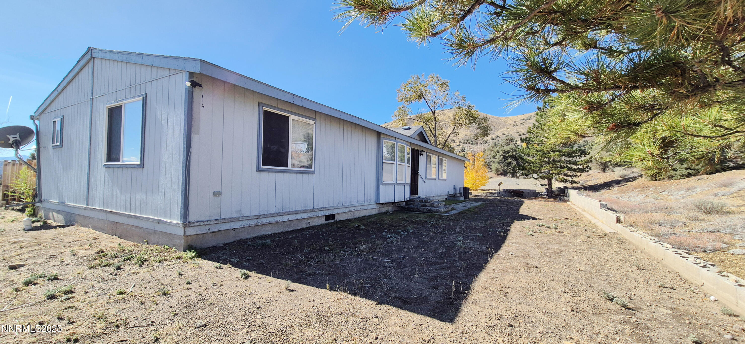 1275 Slate Road Topaz Ranch Estates, NV 89444 - Photo 5 of 6 a view of a house with a snow in the yard