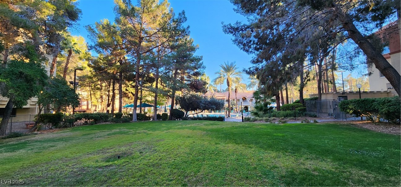 210 East Flamingo Road, Unit 326 Las Vegas, NV 89169 - Photo 51 of 58 View from park area towards main pool and clubhouse.