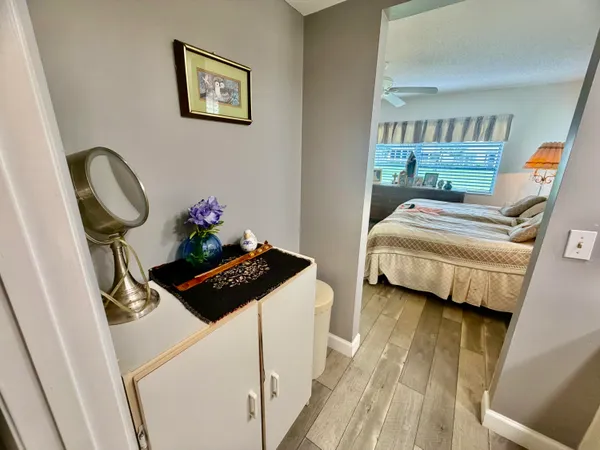 a bedroom with a bed and couch