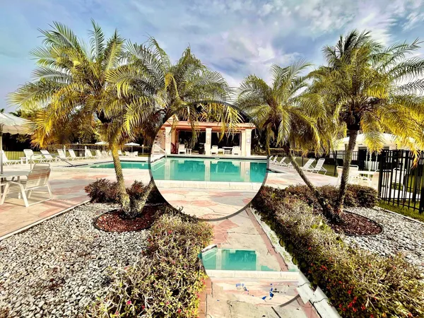 an aerial view of a house with outdoor space patio and ocean view