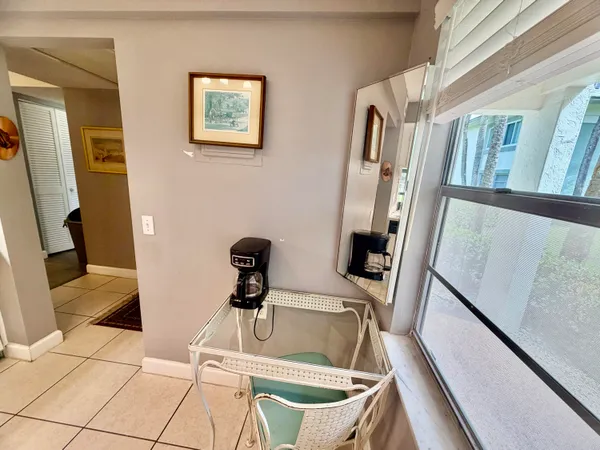 a kitchen with a sink a stove top oven and cabinets