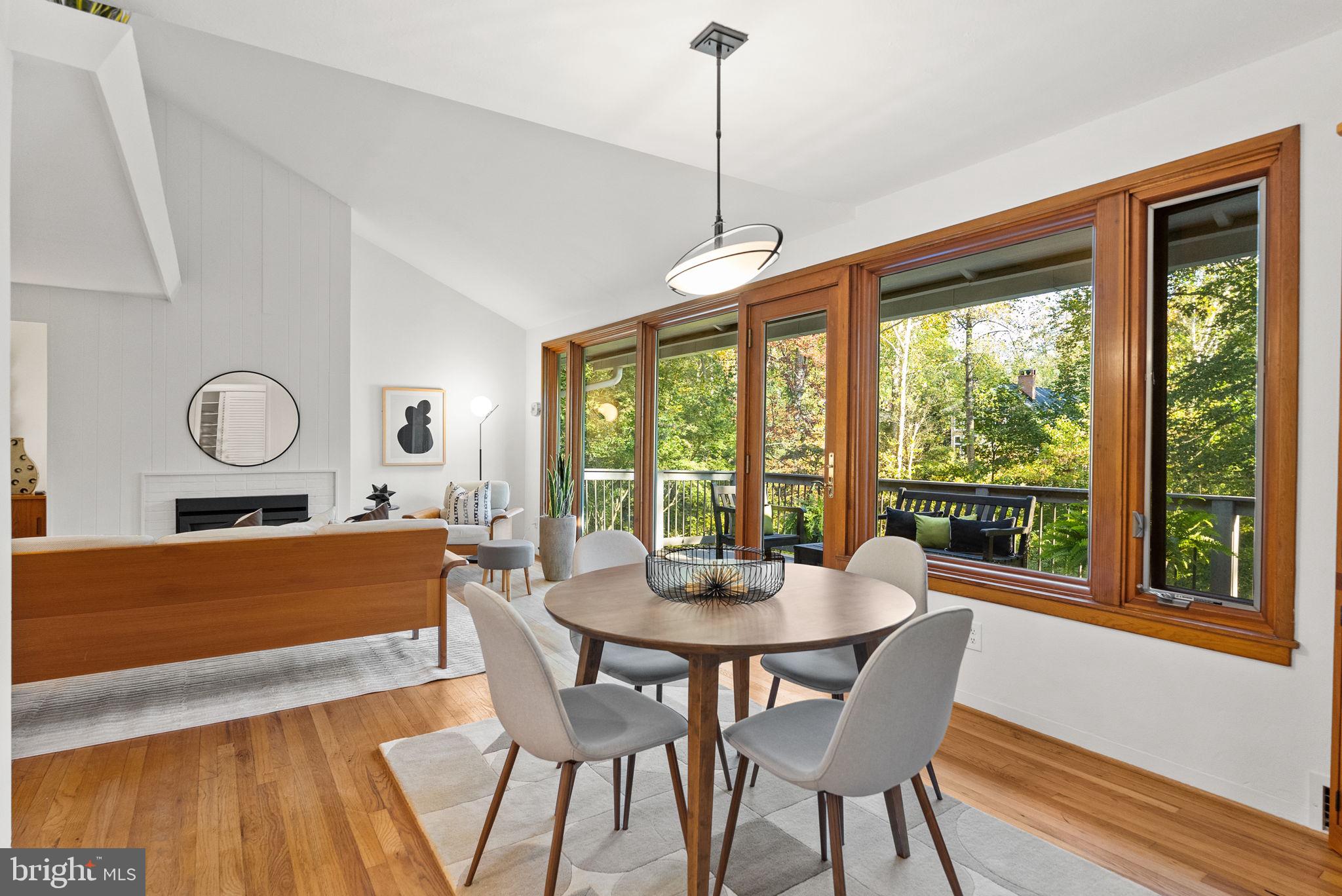 7111 Braeburn Place Bethesda, MD 20817 - Photo 13 of 86 a dining room with furniture window wooden floor