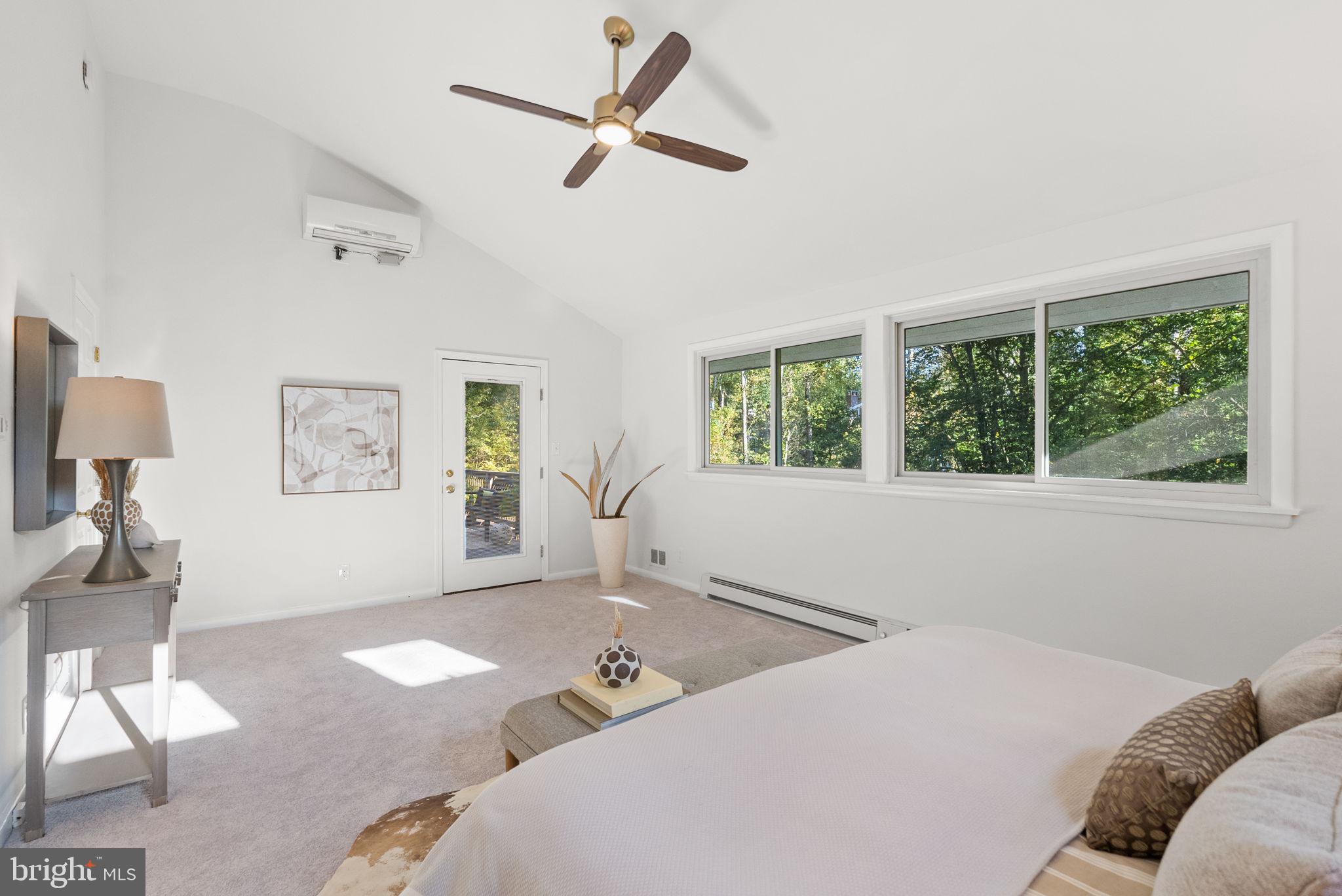 7111 Braeburn Place Bethesda, MD 20817 - Photo 23 of 86 a bedroom with furniture and a window