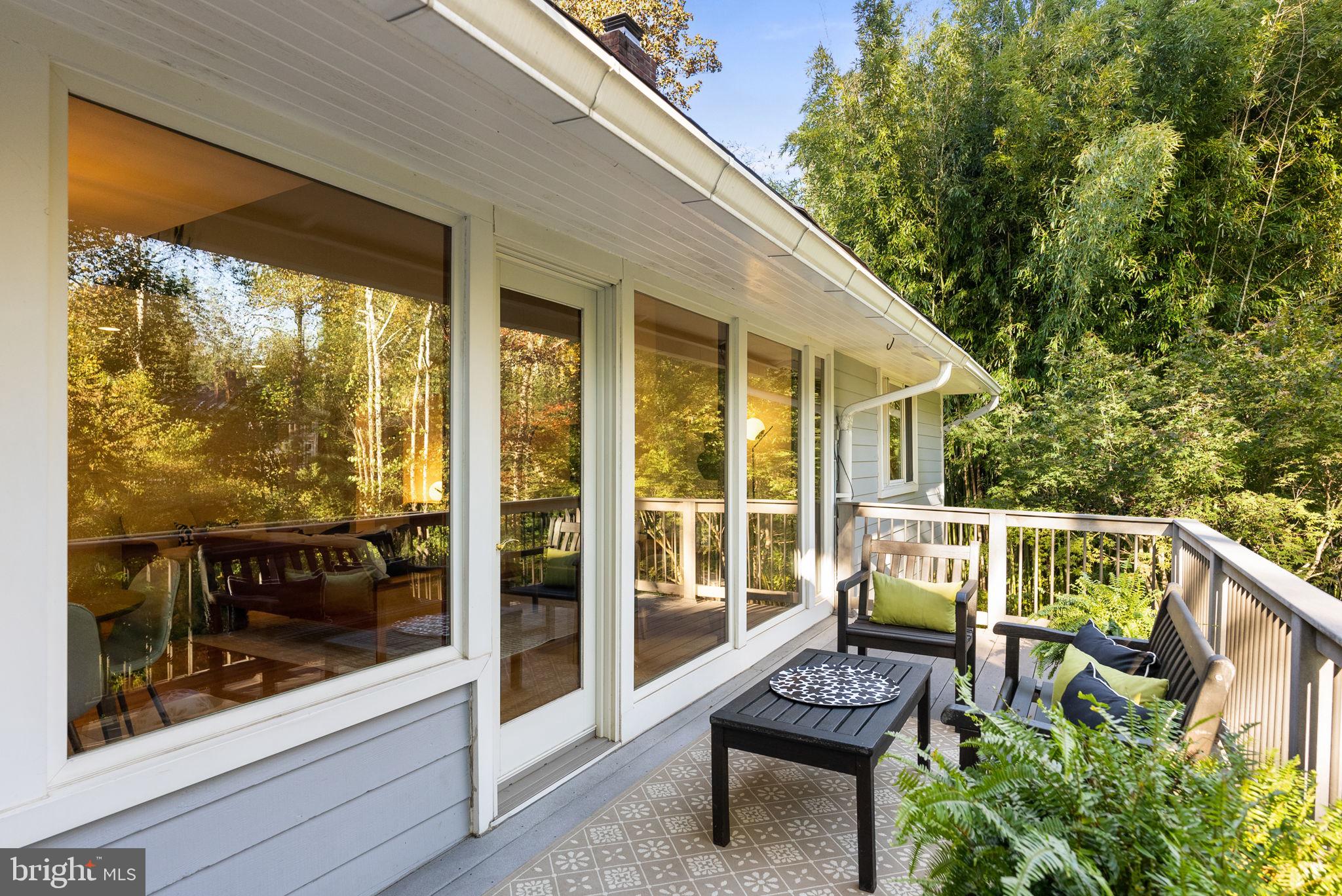 7111 Braeburn Place Bethesda, MD 20817 - Photo 59 of 86 a view of a chairs and table in the balcony