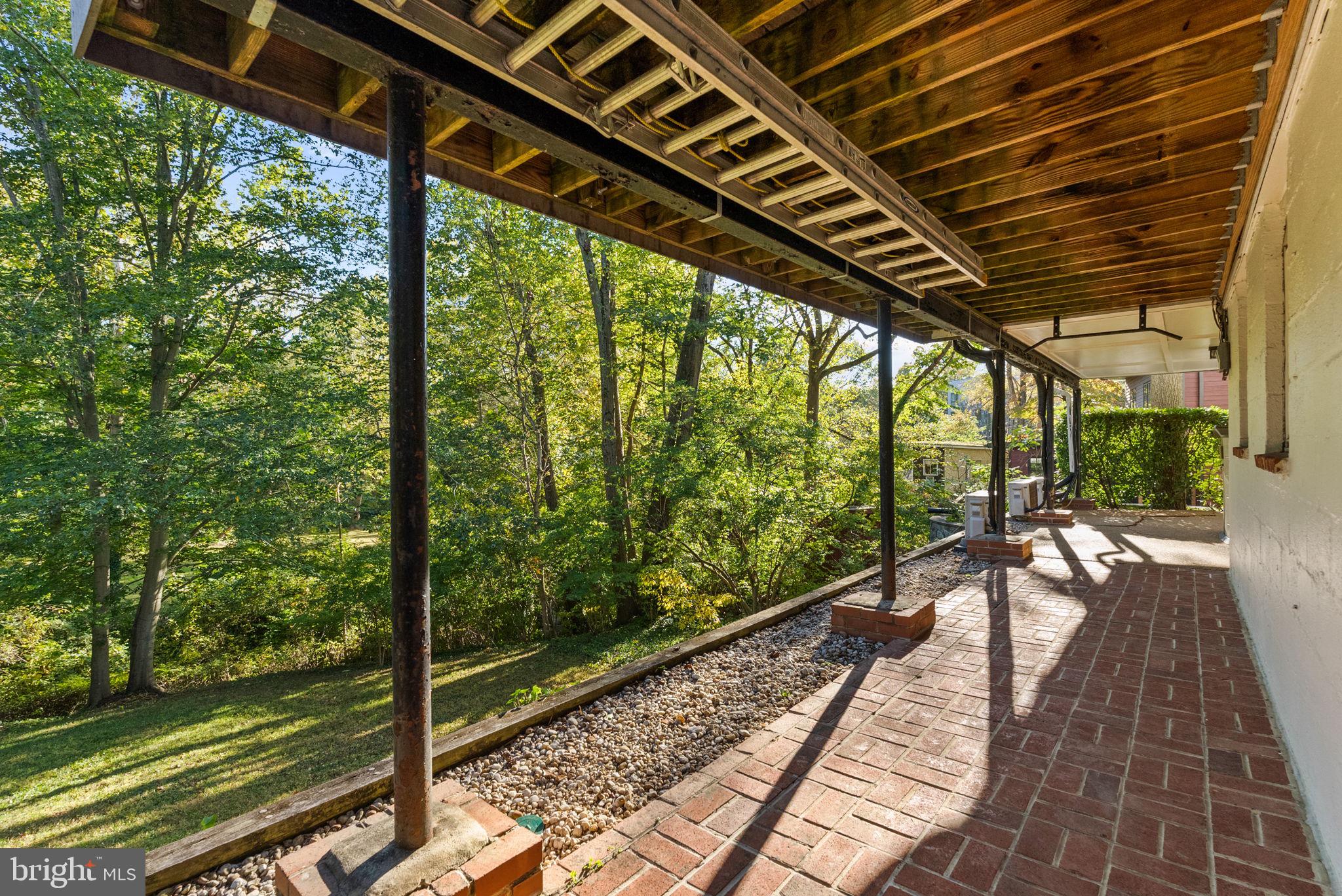 7111 Braeburn Place Bethesda, MD 20817 - Photo 65 of 86 a view of a balcony with wooden floor