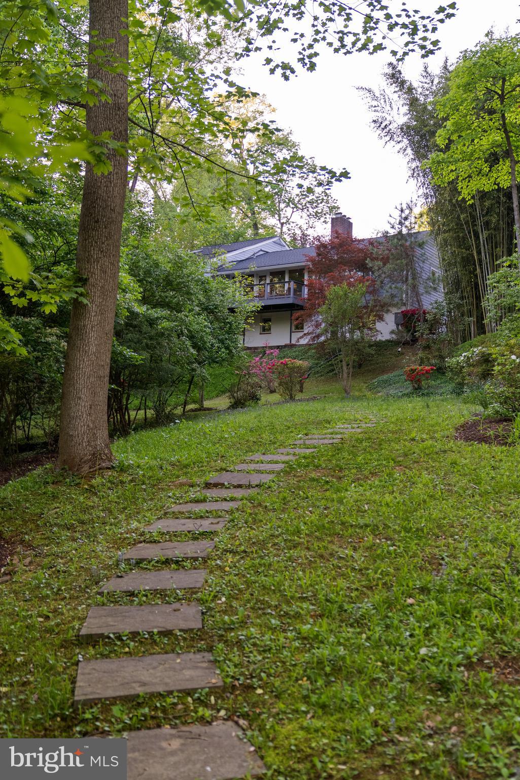 7111 Braeburn Place Bethesda, MD 20817 - Photo 68 of 86 a view of a house with a yard