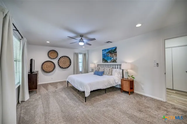 a view of a lake with outdoor seating