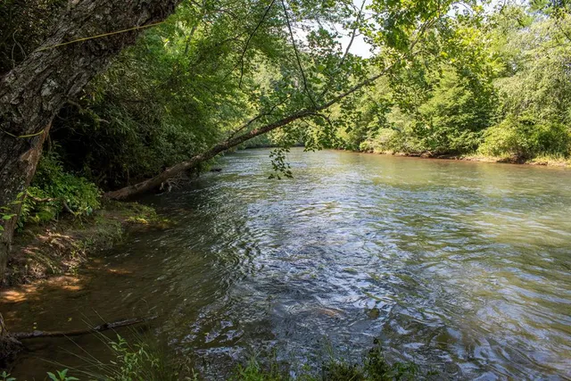 a view of a lake next to a building