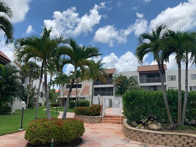 301 Racquet Club Road, Unit 104 Weston, FL 33326 - Photo 3 of 24 FRONT OF BUILDING