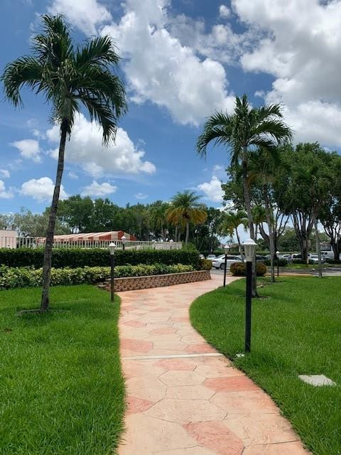 301 Racquet Club Road, Unit 104 Weston, FL 33326 - Photo 4 of 24 POOL VIEW