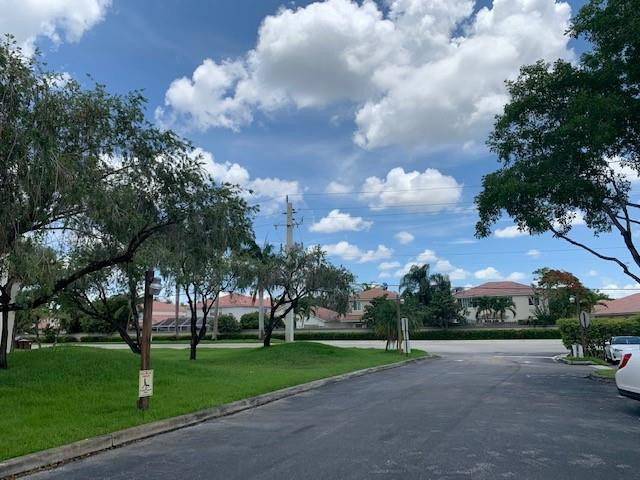 301 Racquet Club Road, Unit 104 Weston, FL 33326 - Photo 5 of 24 STREET VIEW