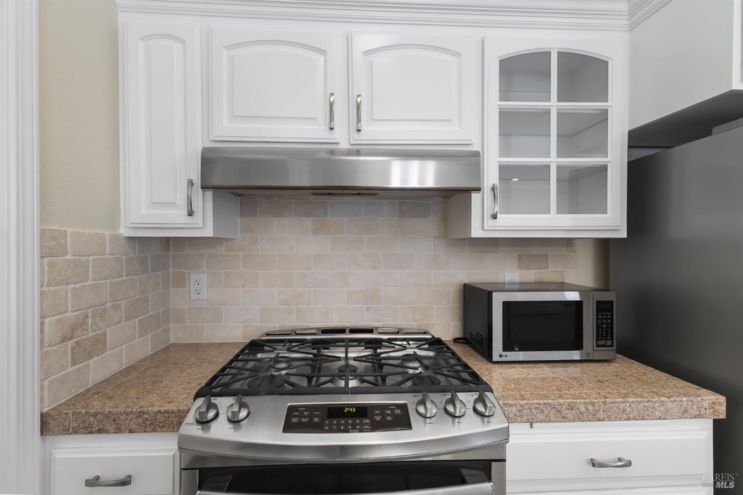 2177 Vista Del Rancho Fairfield, CA 94534 - Photo 10 of 28 a stove top oven sitting inside of a kitchen