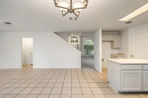 a view of a kitchen with a sink