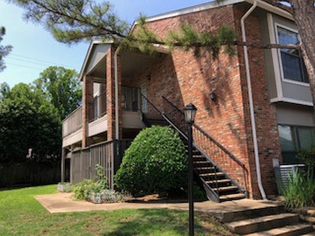 408 Pebble Way, Unit 253 Arlington, TX 76006 - Photo 1 of 1 a backyard of a house with lots of green space