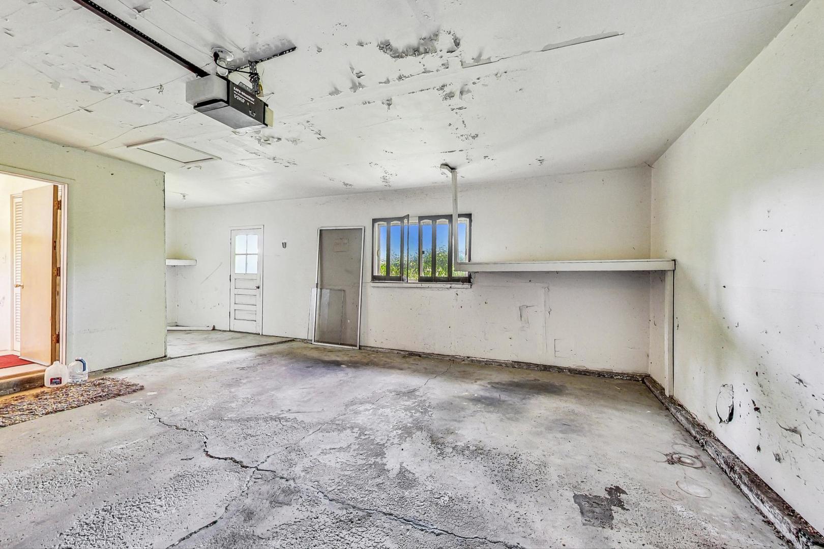 109 Mulberry Road Deerfield, IL 60015 - Photo 19 of 32 a view of a big room with cabinet and windows