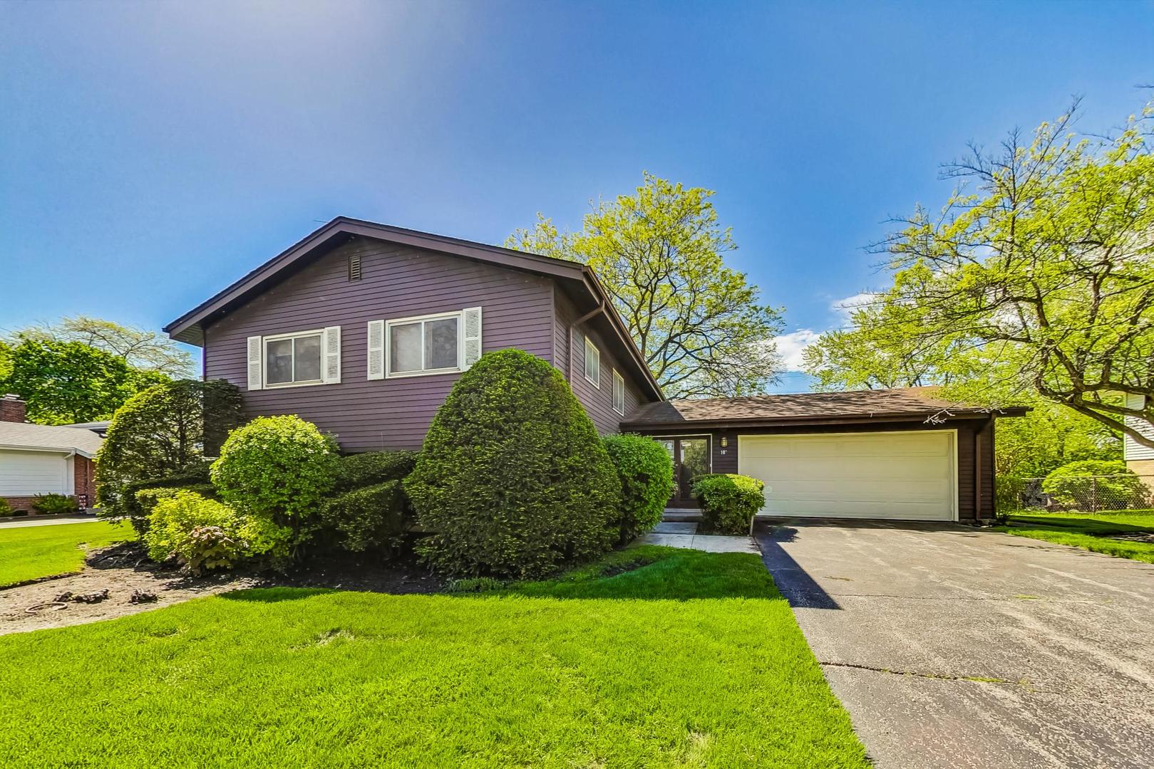 109 Mulberry Road Deerfield, IL 60015 - Photo 3 of 32 a front view of a house with garden