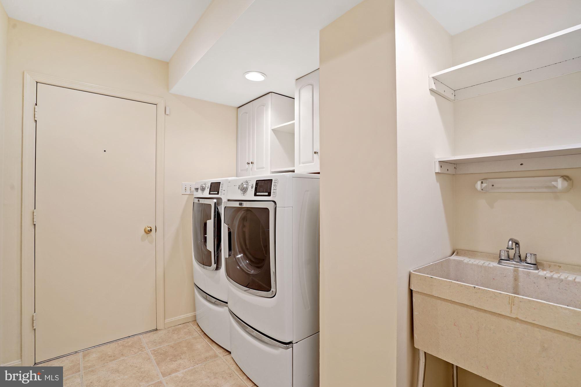 516 Springvale Road Great Falls, VA 22066 - Photo 17 of 44 Laundry features front loading Washer and Dryer