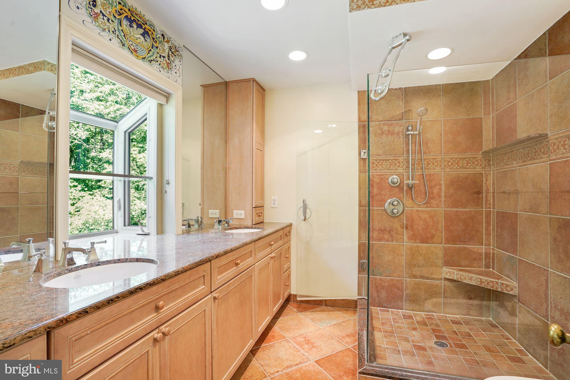 516 Springvale Road Great Falls, VA 22066 - Photo 22 of 44 Renovated Master Bath with Italian tile