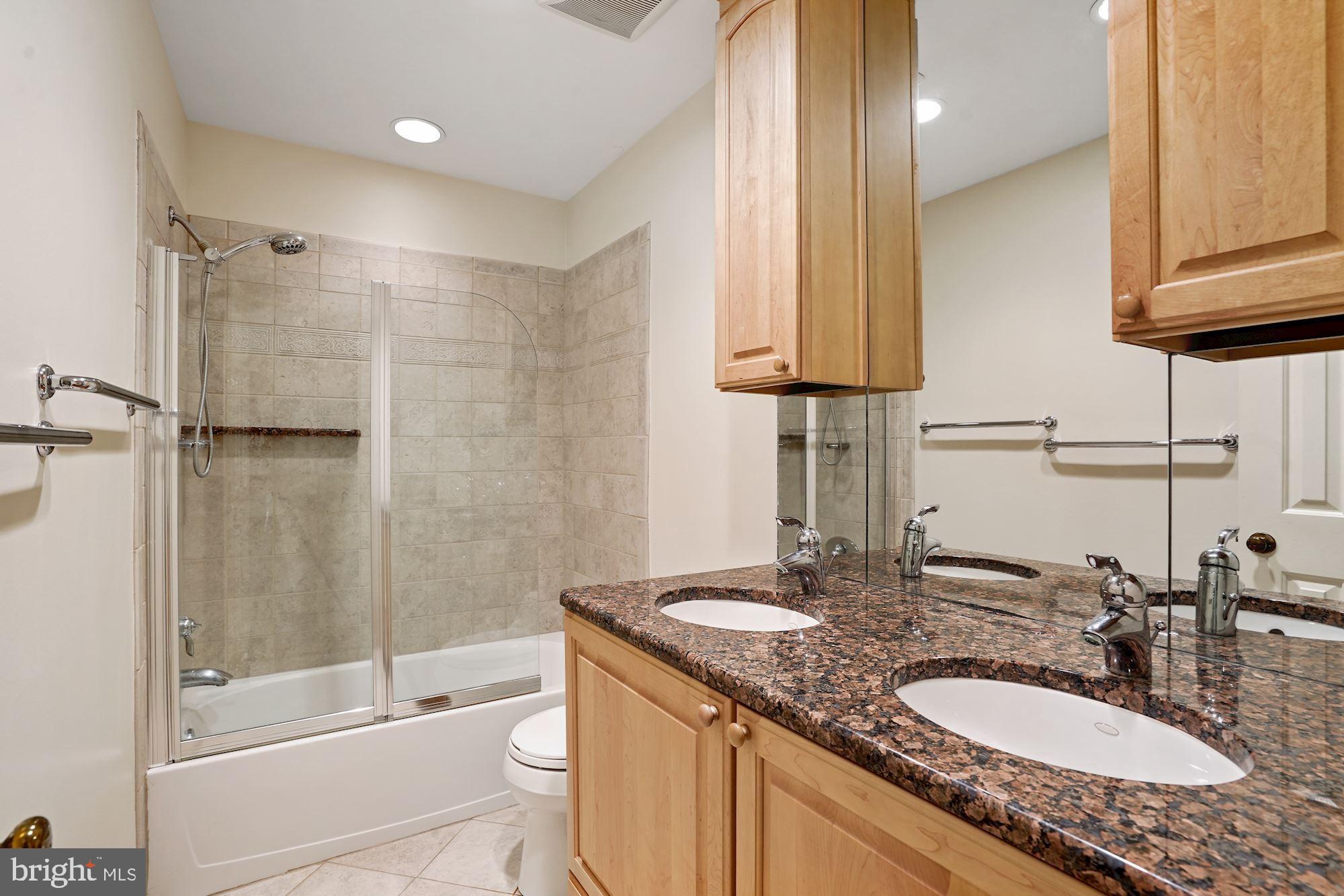 516 Springvale Road Great Falls, VA 22066 - Photo 27 of 44 Upper Level Hall Bath with granite