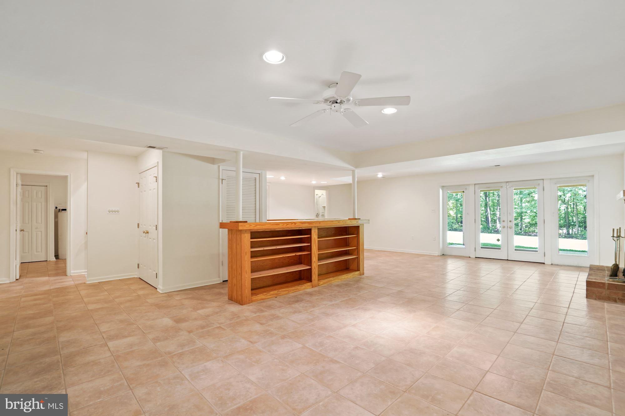 516 Springvale Road Great Falls, VA 22066 - Photo 28 of 44 Lower level Rec Room opens onto patio