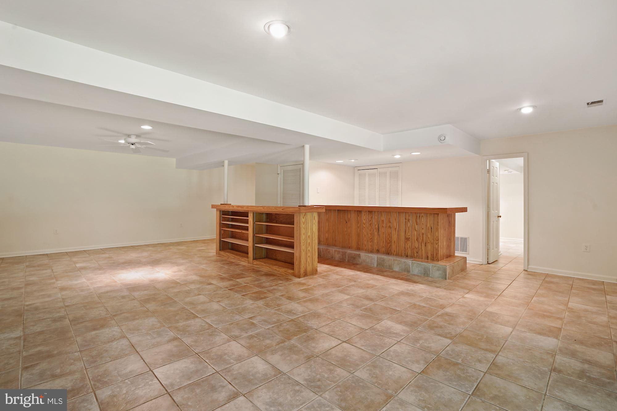 516 Springvale Road Great Falls, VA 22066 - Photo 30 of 44 Built-ins and Wet Bar