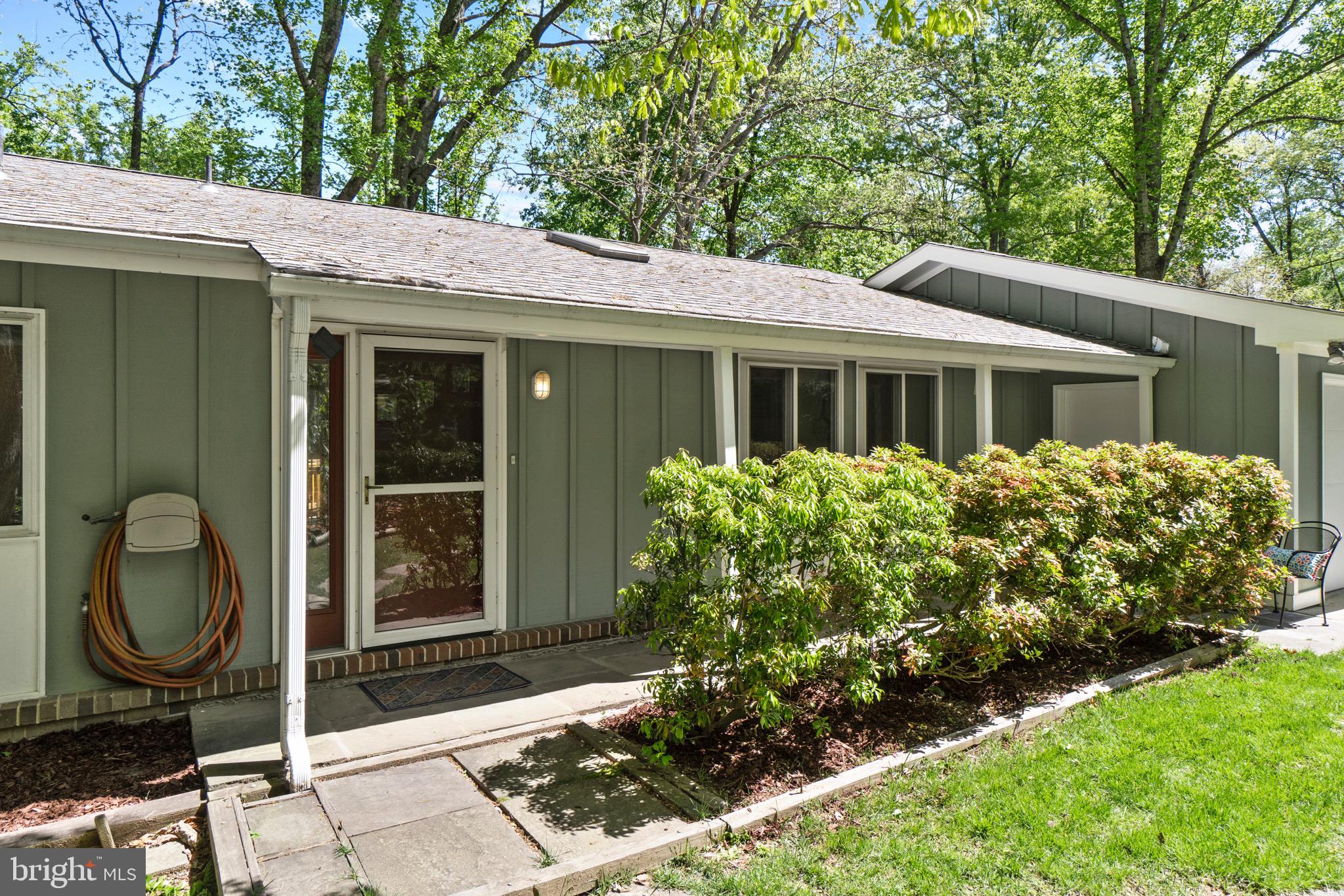 11318 Myrtle Lane Reston, VA 20191 - Photo 1 of 40 a backyard of a house with seating space