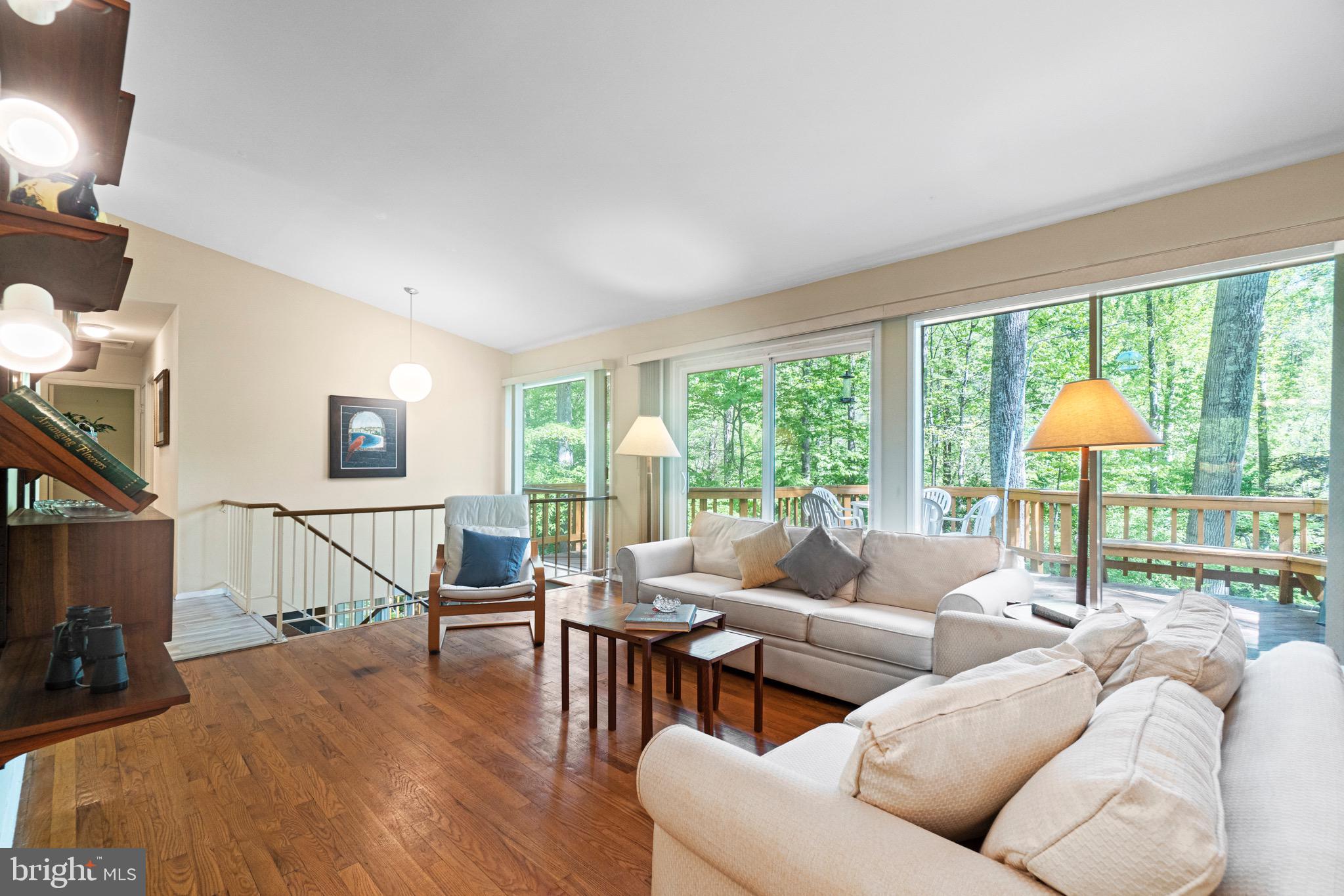 11318 Myrtle Lane Reston, VA 20191 - Photo 13 of 40 a living room with furniture and a large window