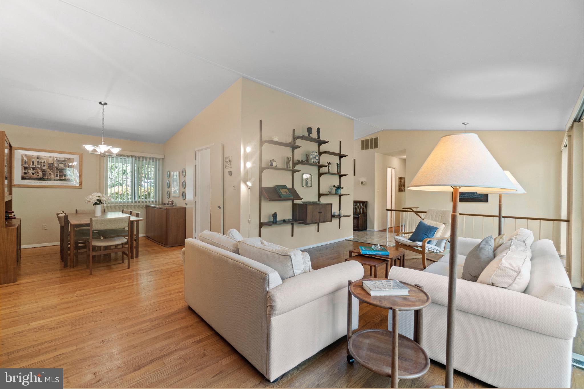11318 Myrtle Lane Reston, VA 20191 - Photo 14 of 40 a living room with furniture and a table