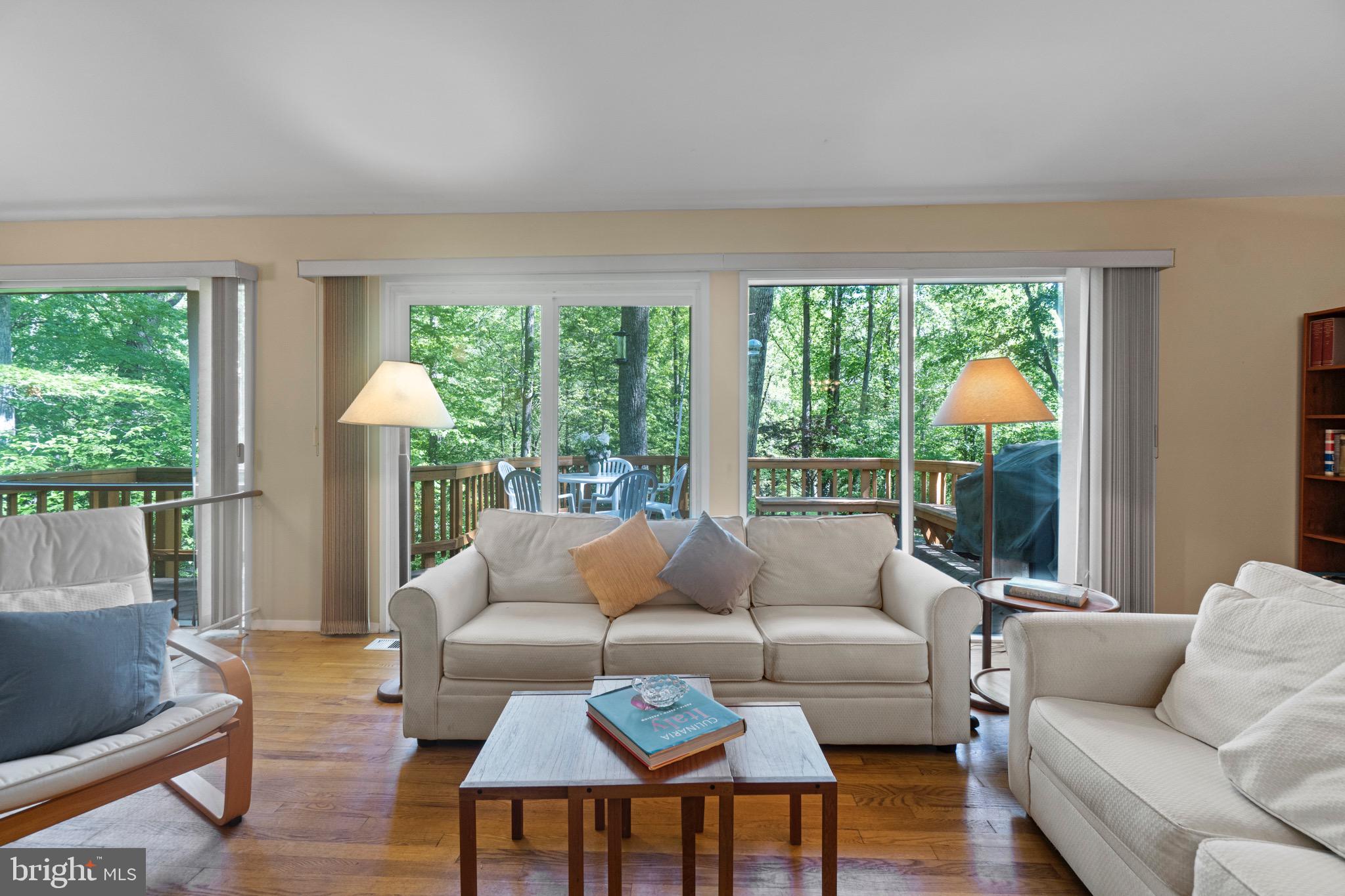 11318 Myrtle Lane Reston, VA 20191 - Photo 15 of 40 a living room with furniture and a large window