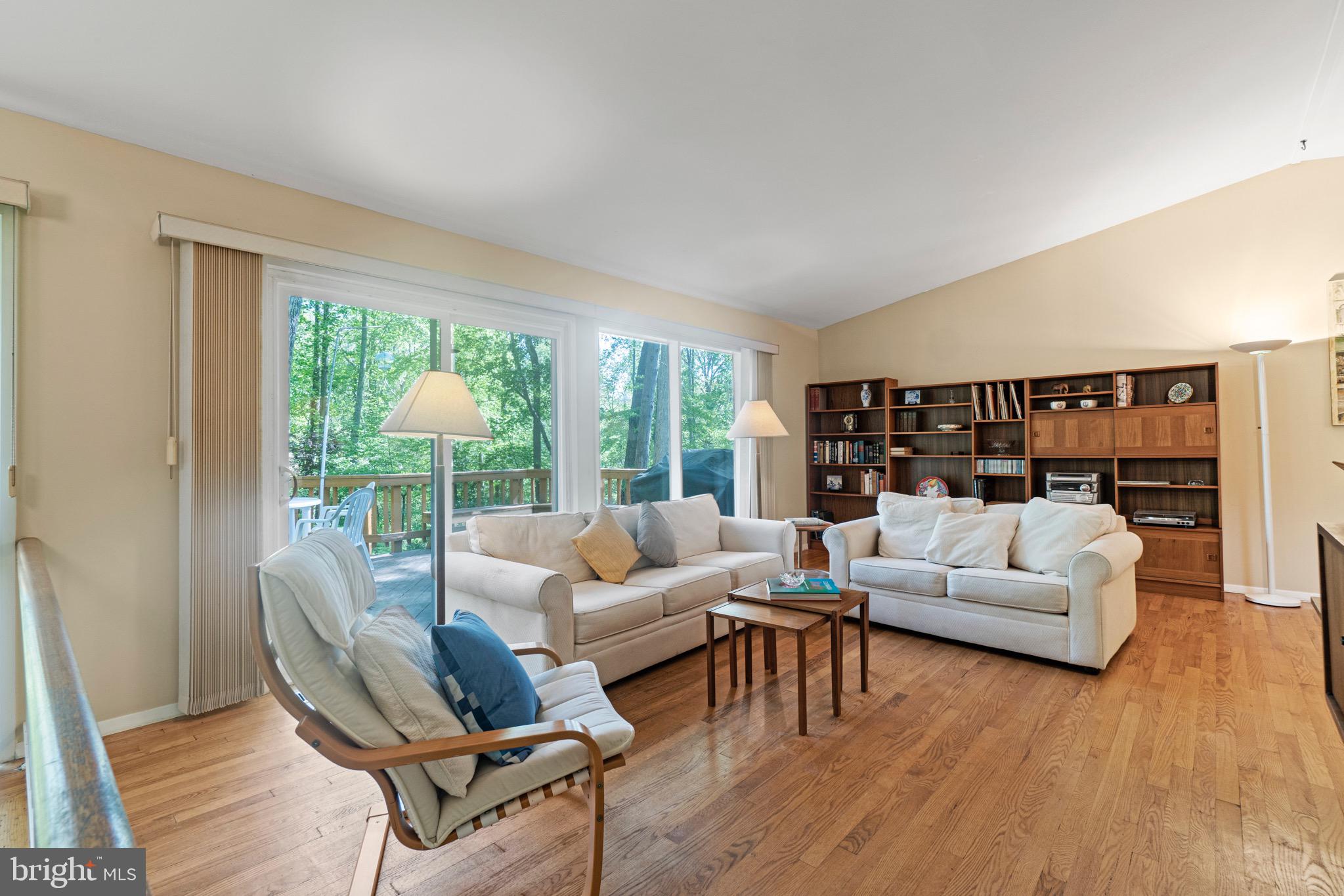 11318 Myrtle Lane Reston, VA 20191 - Photo 16 of 40 a living room with furniture and a large window