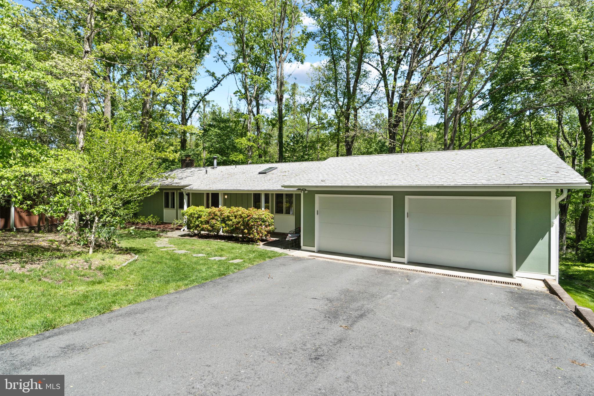 11318 Myrtle Lane Reston, VA 20191 - Photo 2 of 40 front view of a house with a garden