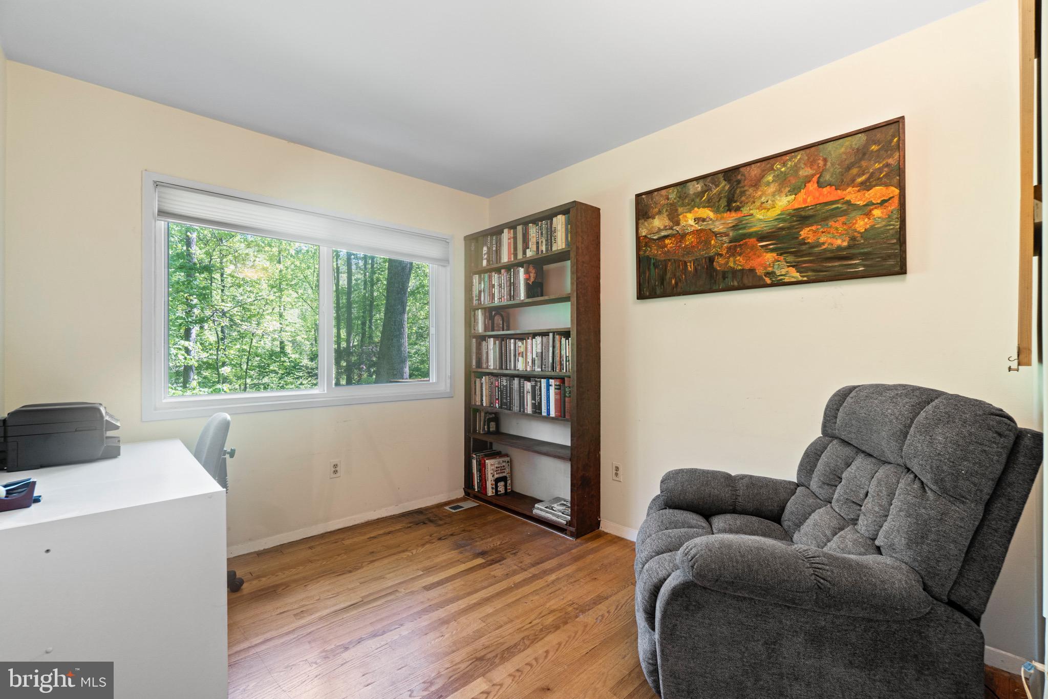 11318 Myrtle Lane Reston, VA 20191 - Photo 22 of 40 a living room with furniture and a window
