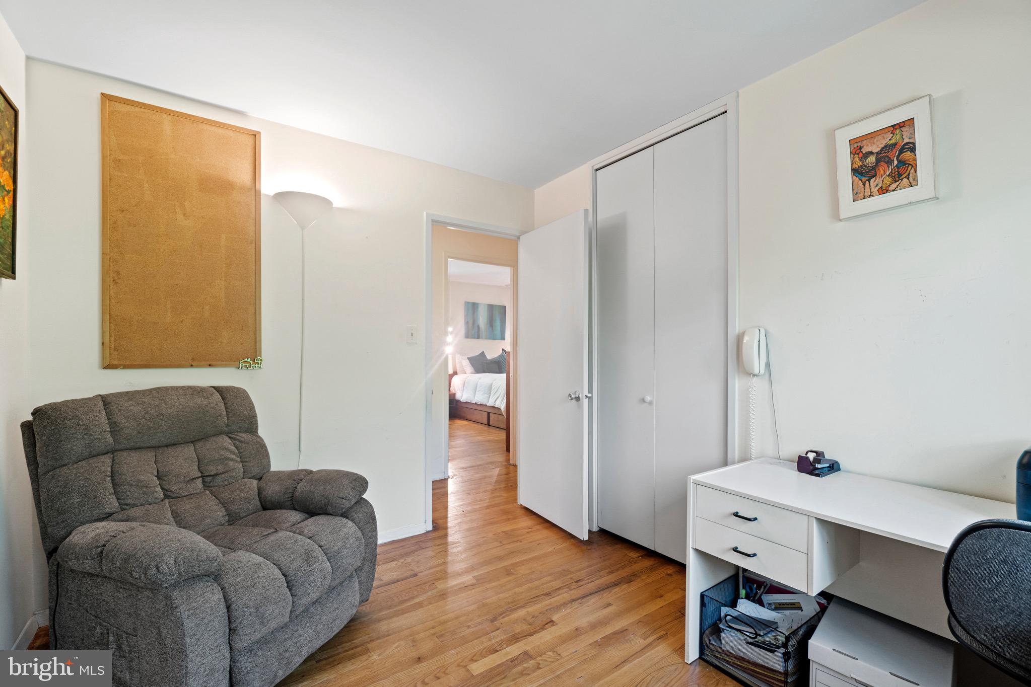 11318 Myrtle Lane Reston, VA 20191 - Photo 23 of 40 a living room with furniture and a window