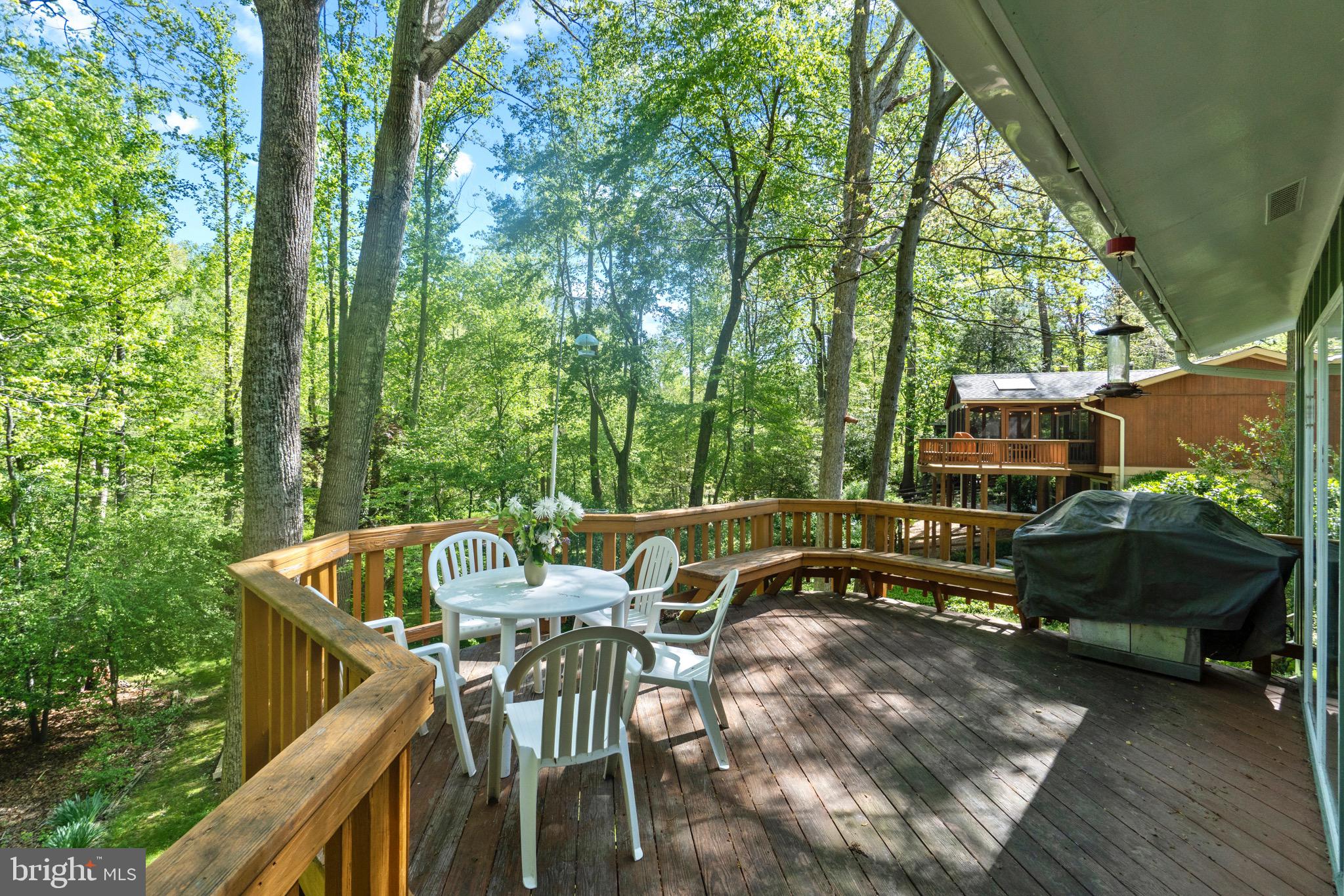 11318 Myrtle Lane Reston, VA 20191 - Photo 36 of 40 a view of an outdoor sitting area with furniture and wooden floor