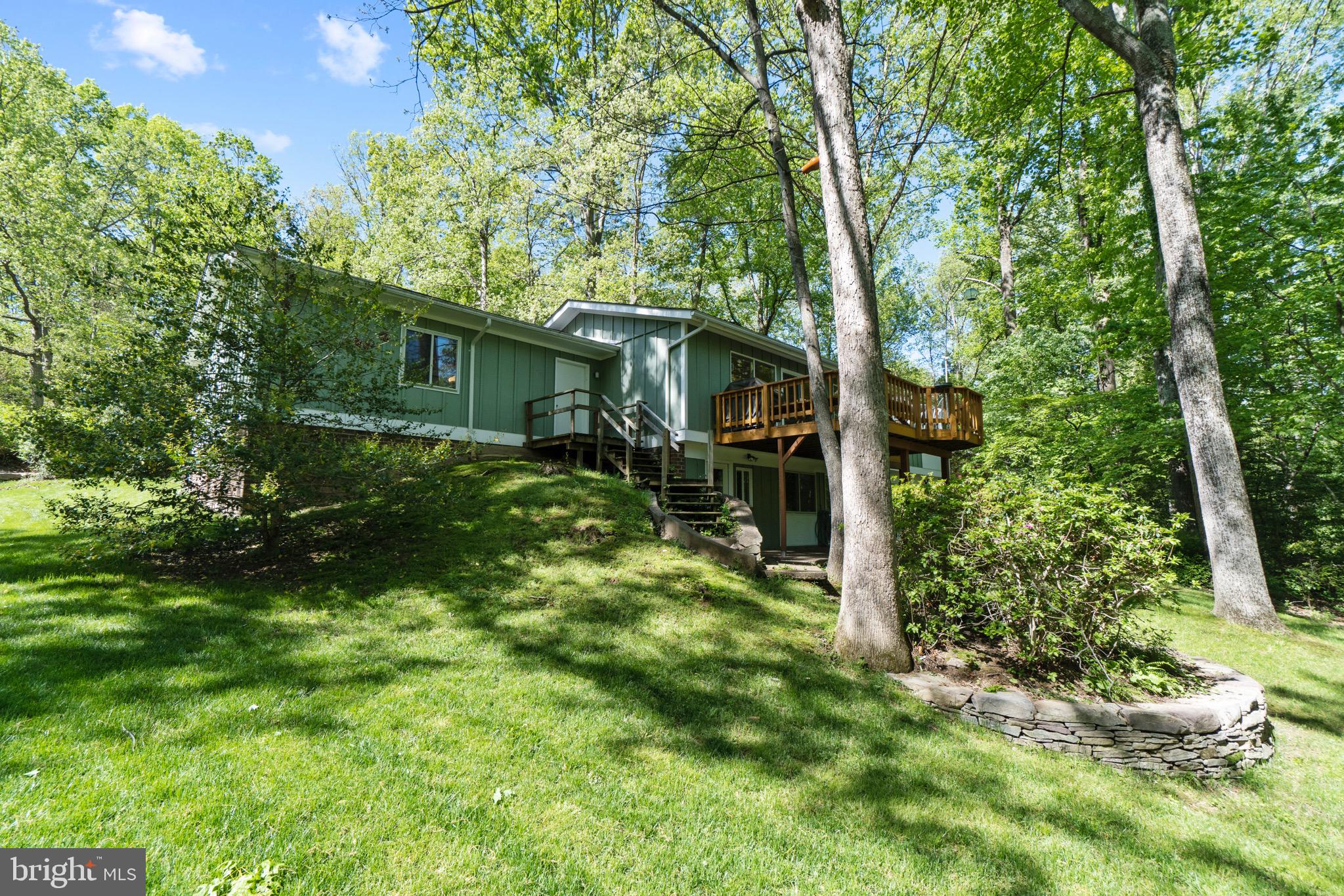 11318 Myrtle Lane Reston, VA 20191 - Photo 38 of 40 a backyard of a house with lots of green space