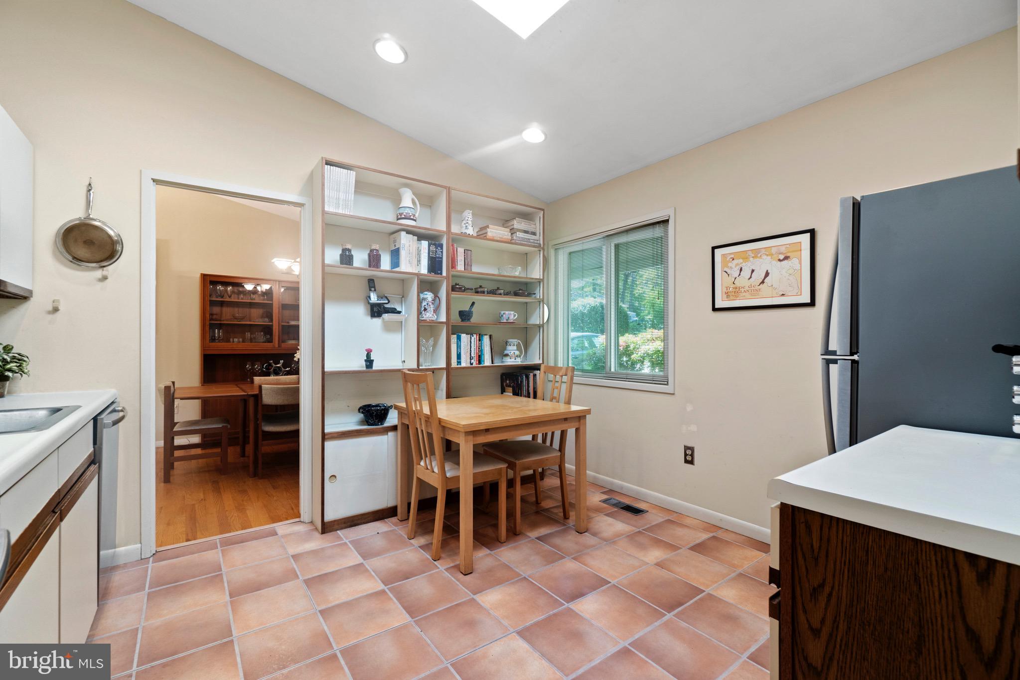 11318 Myrtle Lane Reston, VA 20191 - Photo 6 of 40 a workspace with furniture and window