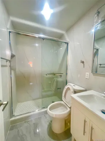 $1,099,000 | 140-14 68th Drive | Kew Gardens Hills